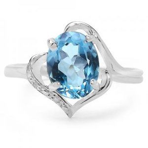 Woman's Diamond & Blue Topaz Ring